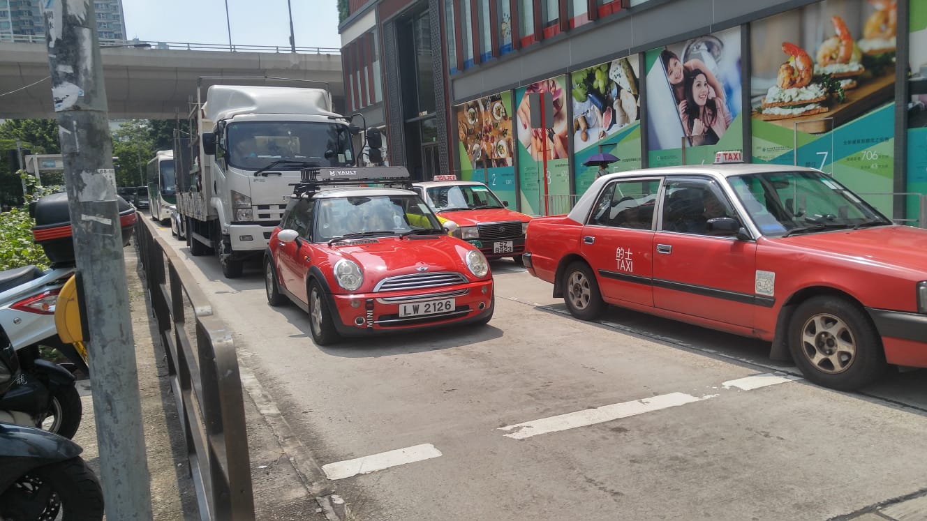 red Mini in Hongkong, Mini Cooper or MINI Cooper Cabrio